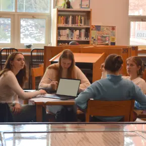 Students completing homework in the learning commons