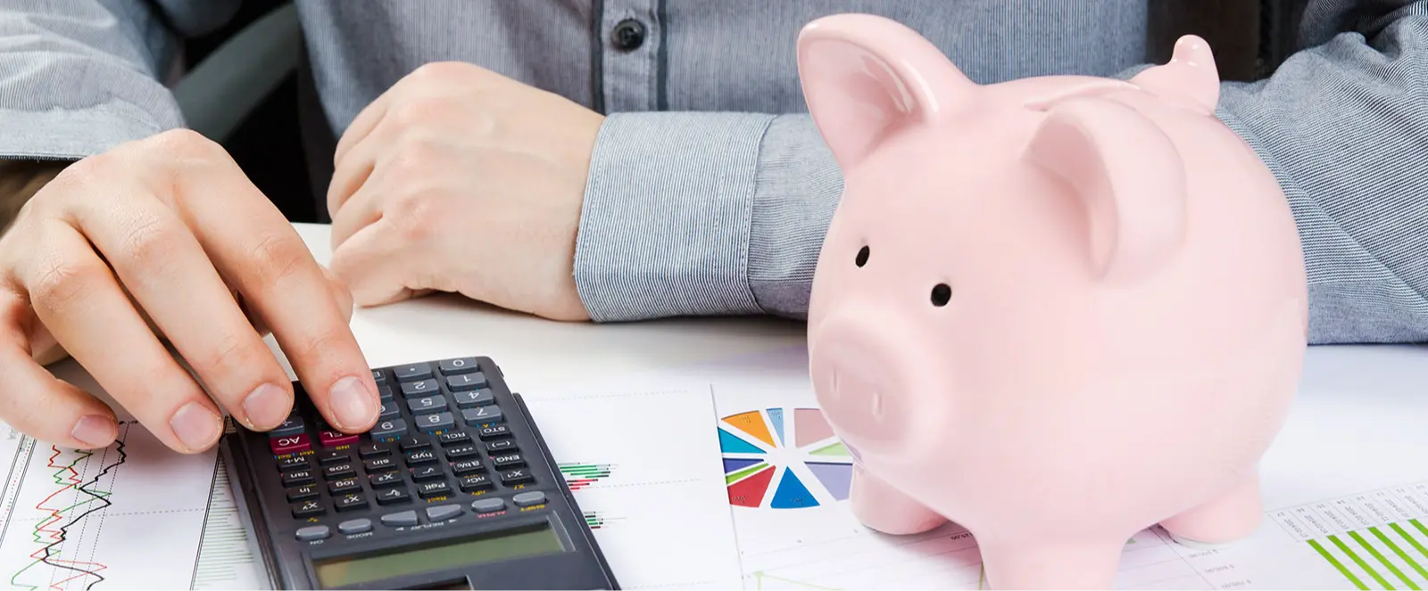 Calculator and piggy bank