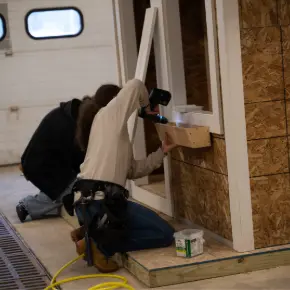 Students building a shed