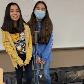 two students with their robot
