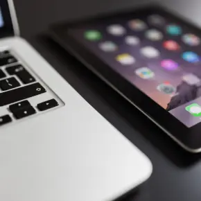 Laptop and a phone up close