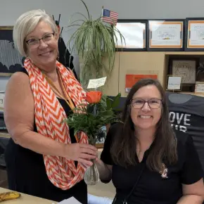 Image of two female staff members