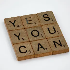 Yes You Can spelled out in scrabble tiles