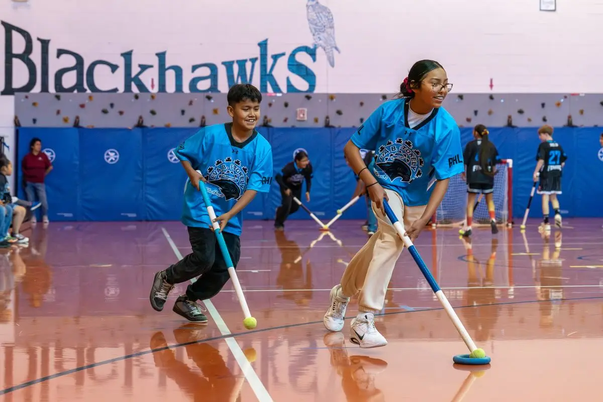 Students playing in gym class