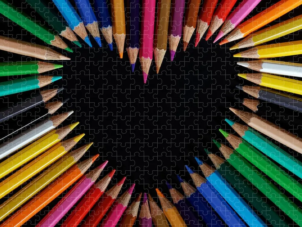 Colored pencils in heart shape