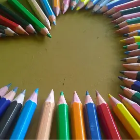 Colored pencils in heart shape