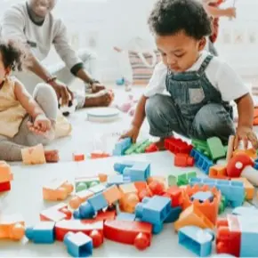 Children playing with mega blocks