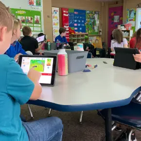 Students working with iPads