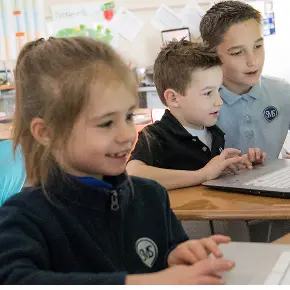 children working on computers