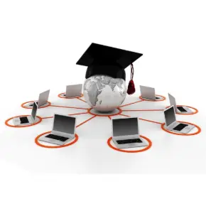 laptops surrounding a globe with a graduation hat