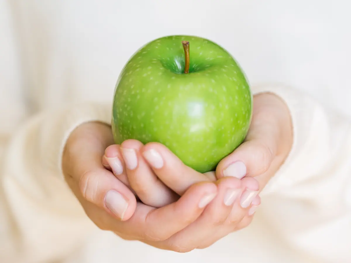 Apple in hands